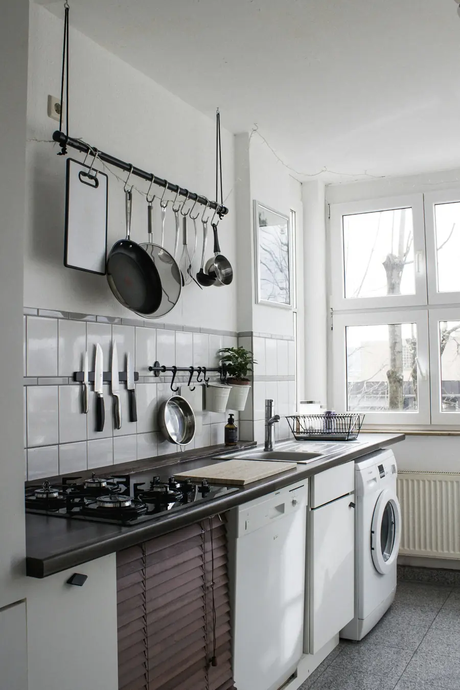 Kitchen with built-in dishwasher and cabinets
