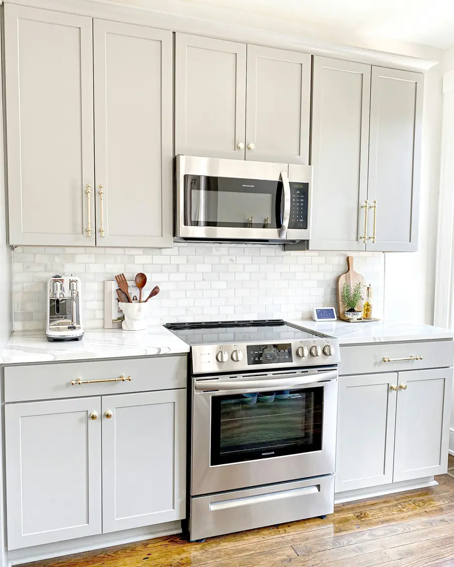 Over-the-range microwave above a stainless steel stove